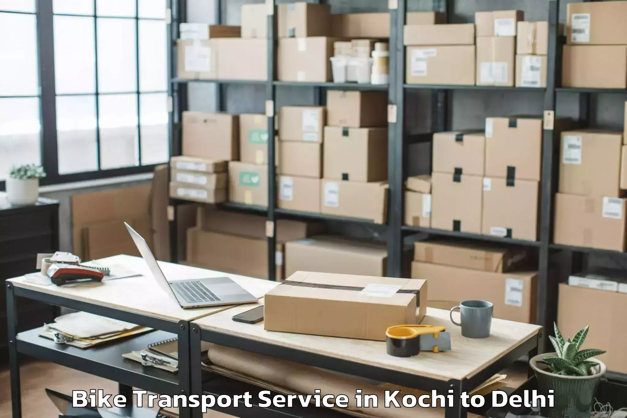 Book Kochi to Defence Colony Bike Transport Online